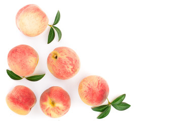 ripe peaches with leaves isolated on white background with copy space for your text. Top view. Flat lay pattern