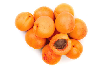 Apricot fruits isolated on white background. Top view. Flat lay pattern