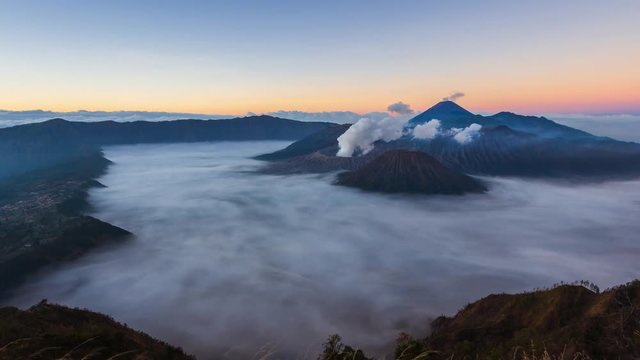 Bromo Volcano Sunrise Landmark Nature Travel Place Of Indonesia 4K Time Lapse (tilt down)