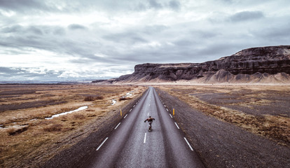 Man exploring beautiful destination with his longboard © oneinchpunch