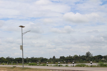 Fototapeta premium sport light post on white sky cloud background