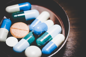 Disease concept. No to drugs and pills concept. Packaging of tablets and pills on the table. 