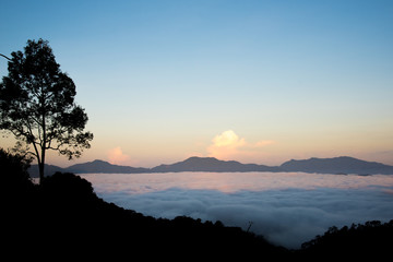 Scenic view of sunrise mountains at northeast Thailand, Mountain range for climbing in mountain trails. the landscape of mountain which including of copy-space for texting. - Vintage retro tone.