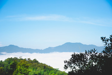 Obraz premium Scenic view of sunrise mountains at northeast Thailand, Mountain range for climbing in mountain trails. the landscape of mountain which including of copy-space for texting. - Vintage retro tone.