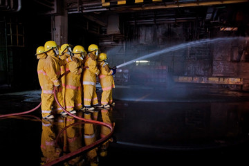 Fireman working at factory office