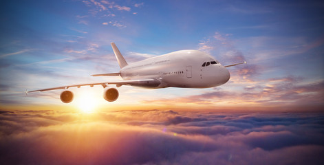 Fototapeta na wymiar Huge two-storey passengers airplane flying above clouds