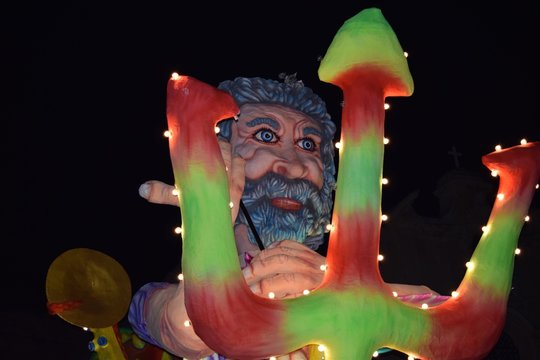 King Canute and his trident illuminated at night