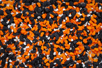 Lot of pumpkin, ghost, bat candies for background. Halloween concept.