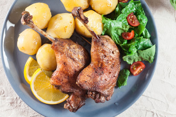 Duck legs confit with boiled potatoes