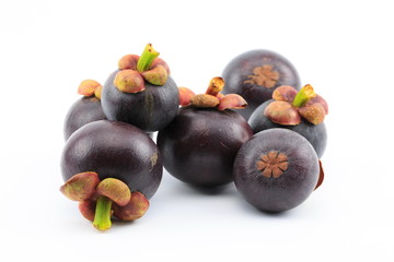 Fresh mangosteens on white background, isolated. Mangosteen, queen of fruits. Tropical fresh fruit.