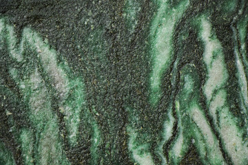green granite close-up and macro texture, granite for wall and floor. Granite background and...