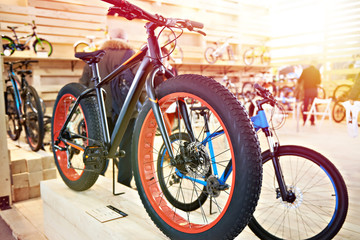 Fototapeta na wymiar Bicycle with fat tires in sports shop