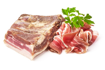 Dried pork meat with slices and green parsley, isolated on white background.
