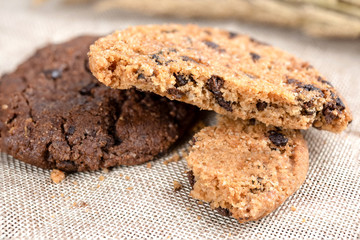 Chocolate cookies on wooden table.