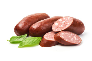 Smoked sausages for grill with basil herb, isolated on white background.