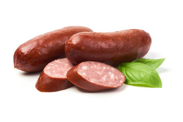 Smoked sausages for grill with basil herb, isolated on white background.