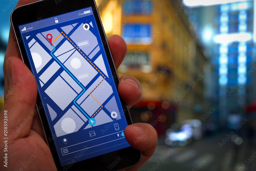 Poster Close up of Tourist using GPS map navigation on smartphone application screen for direction to destination address in the city with travel and technology concept.