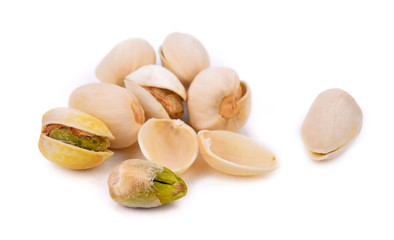 Pistachio kernel isolated on white background.