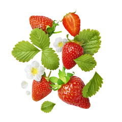 Flying Fresh tasty ripe strawberry with green leaves isolated
