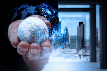 close up of businessman hand showing texture the world concept Elements of this image furnished by NASA 