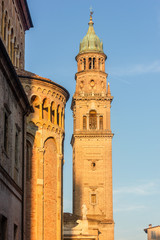 Fototapeta na wymiar Side of Parma cathedral with bell tower of the church of San Giovanni in Parma, Italy