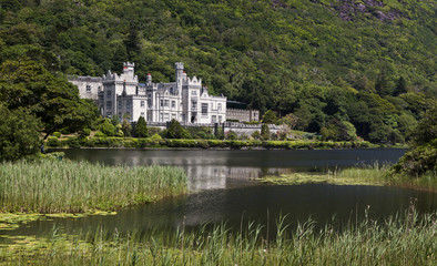 Fototapeta na wymiar Kylemore Abbey, a Benedictine monastery founded on the grounds of Kylemore Castle, in Connemara. Famous tourist attraction in County Galway, Ireland. 