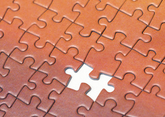 Concept image. One piece missing from a puzzle.