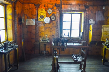 An old school vintage clock maker workshop at a museum of technology