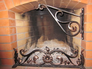 Kamini decorated with iron ornamentation. 