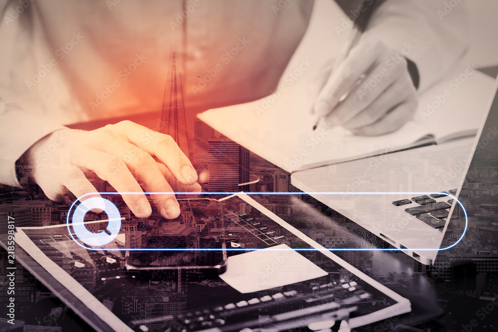 Poster close up of businessman working with smart phone and digital tablet and laptop computer on wooden de
