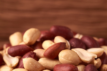 peanut hill Deep fried peanuts over rustic wicker background. emptiness place. Space for text. copyspace
