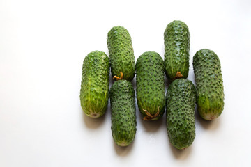Fresh green cucumbers isolated on white background with copy space