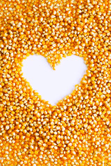 Corn kernels with heart shape inside.