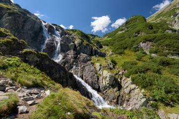 Fototapeta na wymiar the Siklawa waterfall in the Tatra in summer,