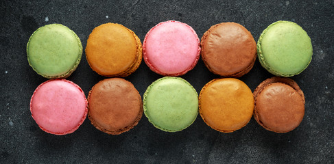 Sweet colorful macarons dessert, almond cake, cookies. selected focus.