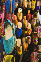 Summer shoes hanging in shop in Morocco