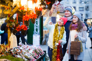 Portrait of young family with girl