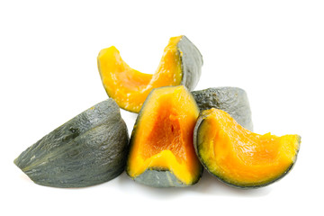 Slices of streamed pumpkin isolated on white background.