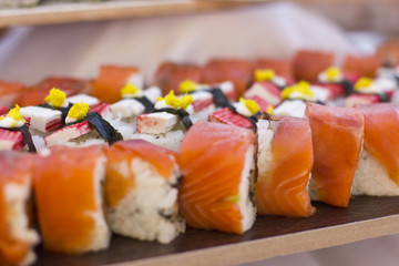 Asian cuisine. Sushi, rolls and sashimi in restaurant