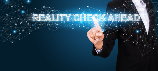 Reality Check Ahead concept with Hand of business pressing a button Reality Check Ahead