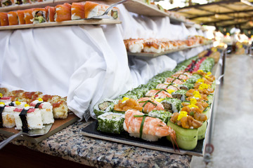 Asian cuisine. Sushi, rolls and sashimi in restaurant