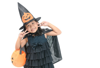 funny child girl in witch costume for Halloween