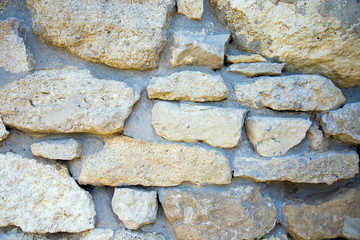 Fragment of a wall from a chipped stone.