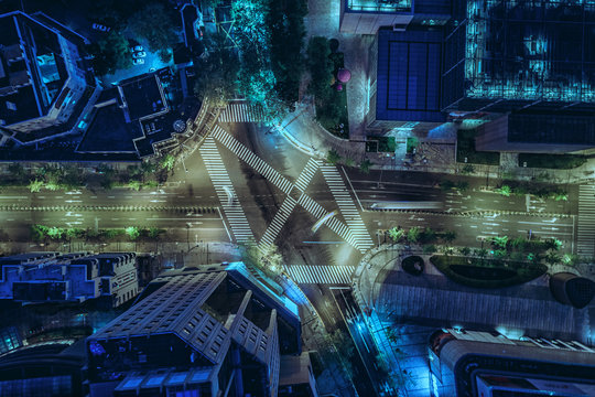 Aerial drone view on city intersection during night