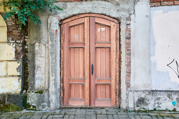 Fototapeta na wymiar old swing wooden door