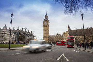 Obraz na płótnie Canvas car traffic in London city. Big Ben in background, long exposure photo
