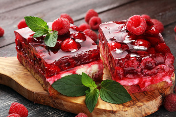 Raspberry Cake for holidays with mint and fresh delicious raspberries.
