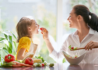 Happy family in the kitchen.