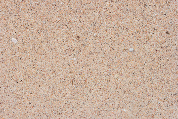 Sand and rock on beach. Summer beach background. Top view