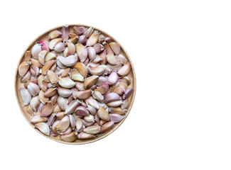garlic in wood bowl on white background